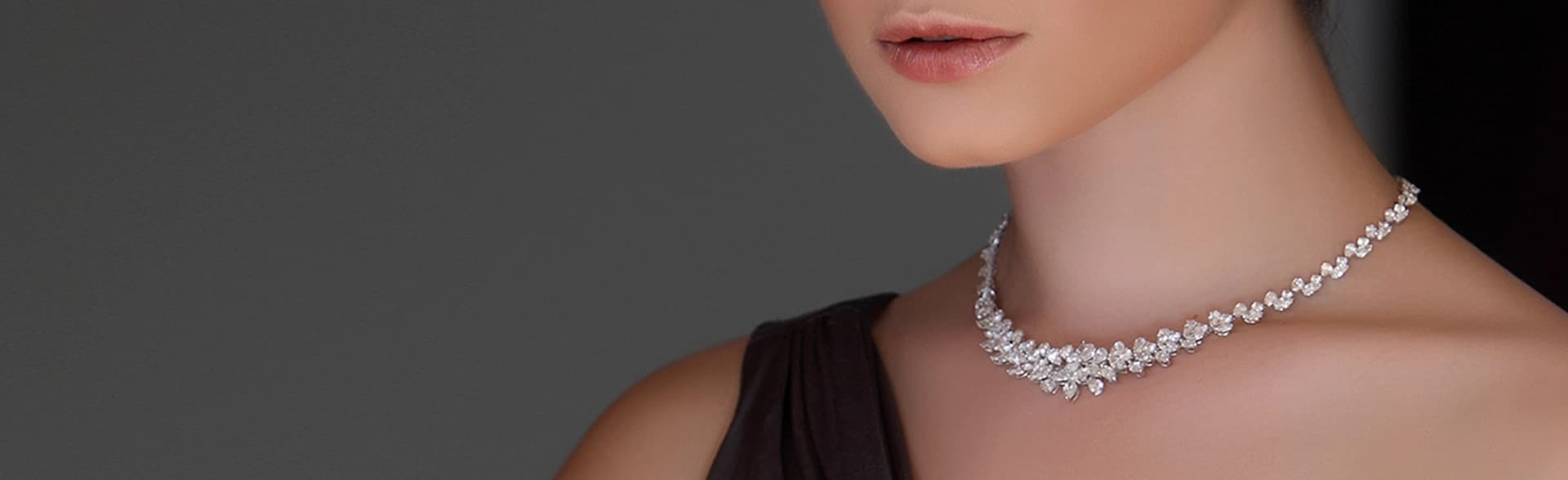Model wearing a diamond necklace