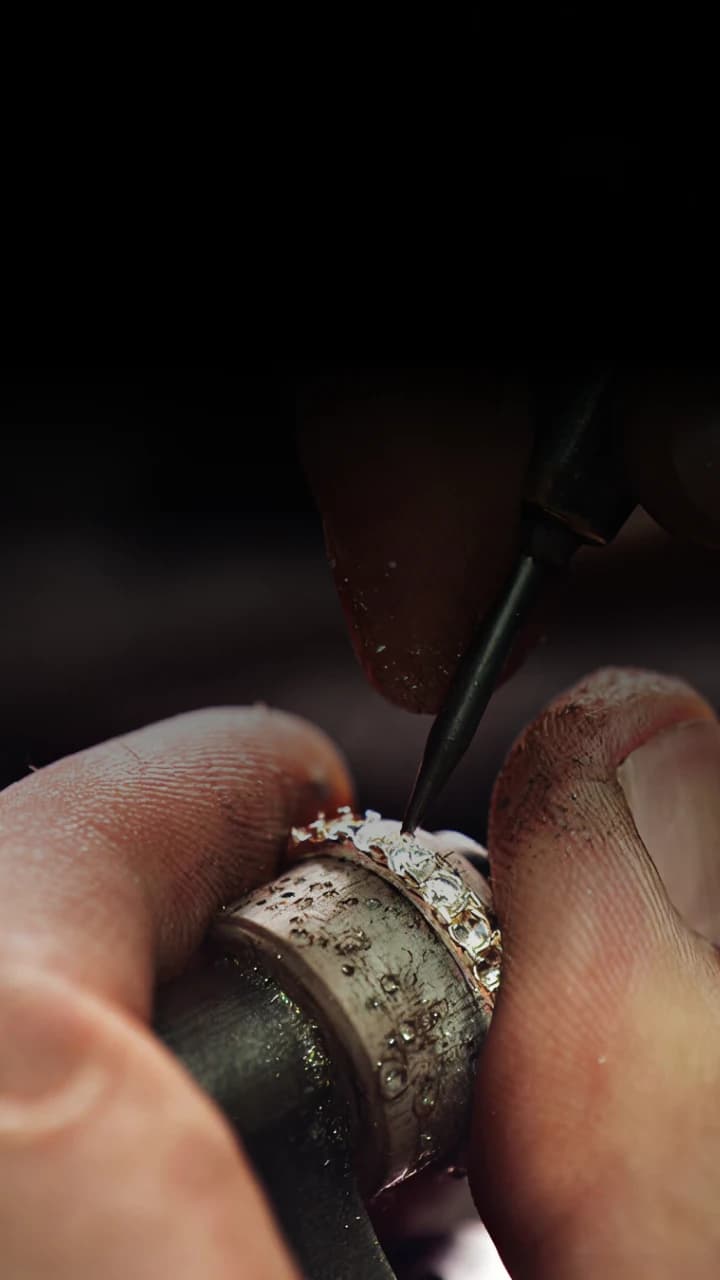 Master setter working on a diamond piece